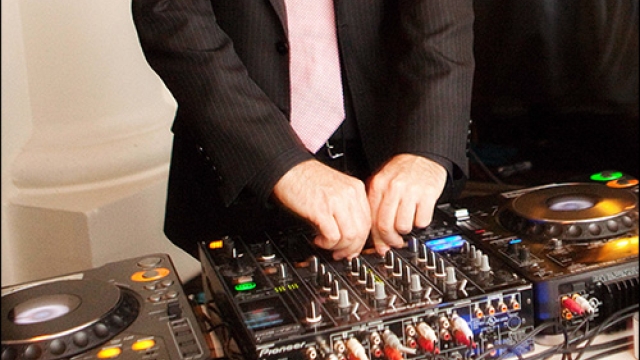 Spinning Memories: Unleashing the Ultimate Wedding DJ Experience!